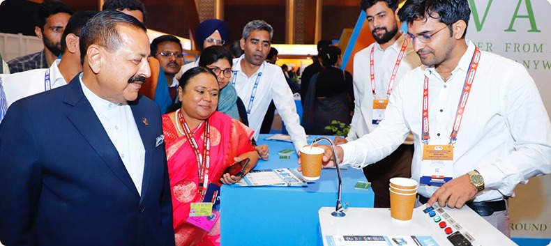 Scientist using a microscope in a lab focused on nanotechnology research and advanced materials testing.